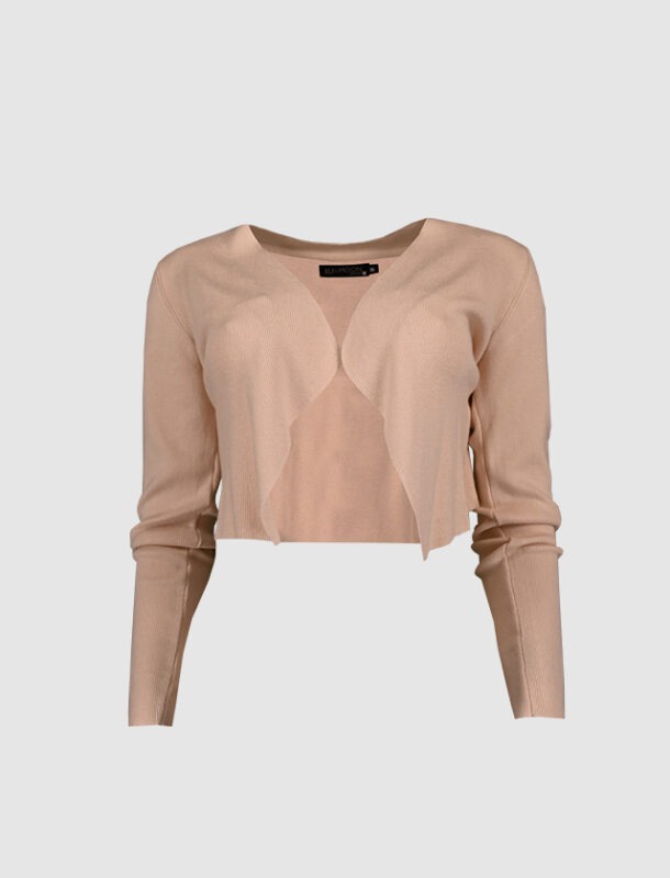 Beige, kurz geschnittene Strickjacke mit langen Ärmeln. Beige, kurz geschnittene Strickjacke mit langen Ärmeln.